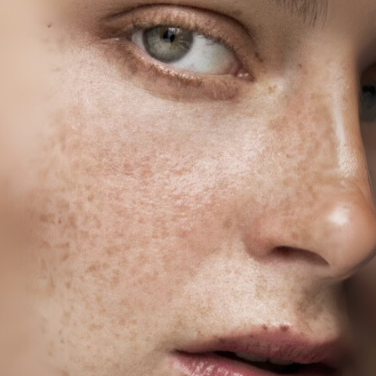 Close-up of a person's face with a neutral expression