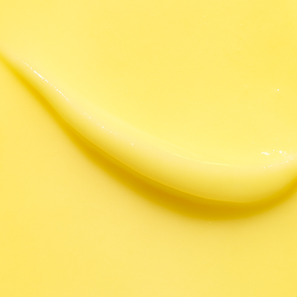 Close-up of a yellow liquid with a glossy surface
