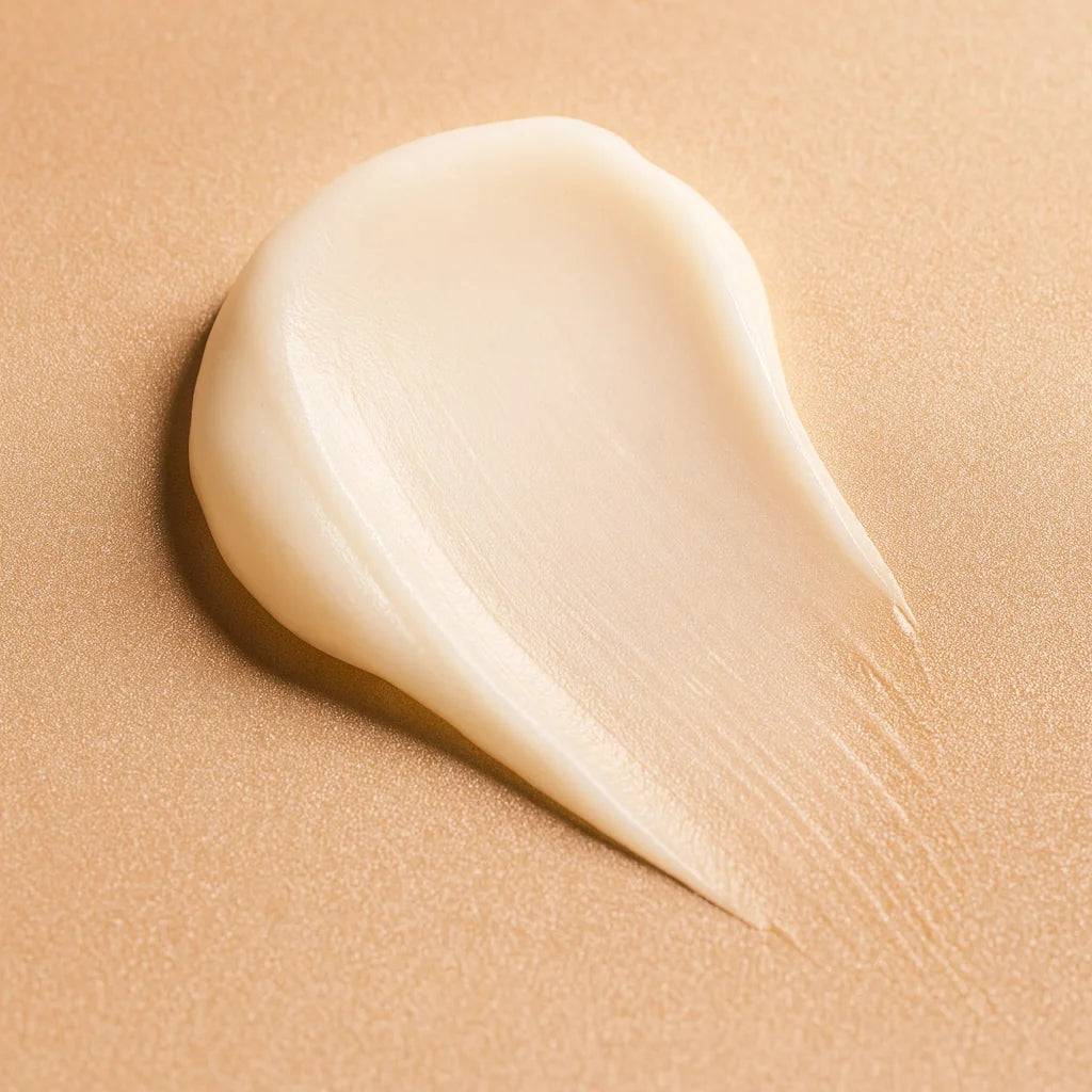 Beige cream smear on a beige background
