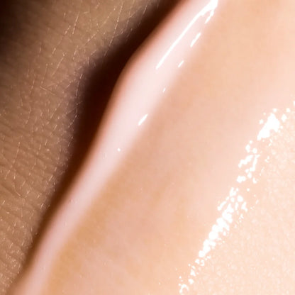 Close-up of a smooth, beige-colored surface with a slight sheen.