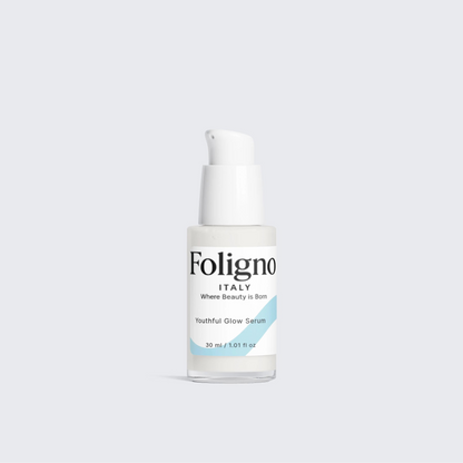 Foligno Italy skincare serum bottle on a light gray background