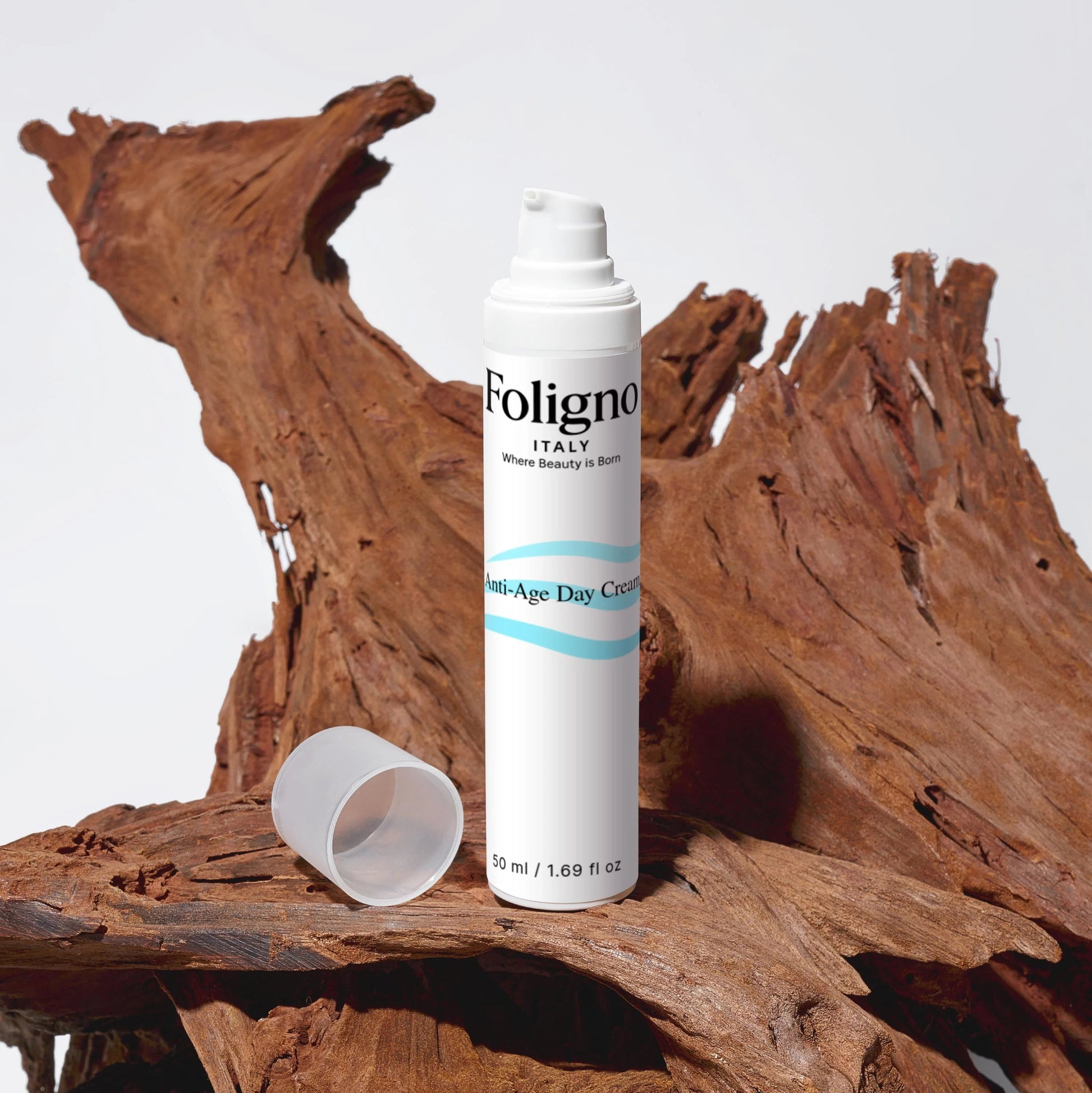 Foligno Day Cream bottle on a wooden surface