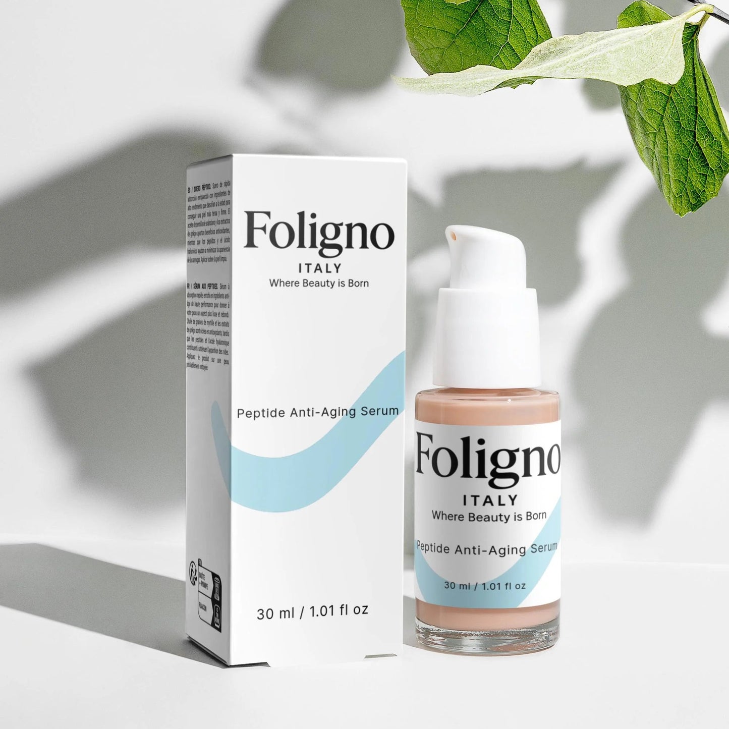 Foligno skincare serum bottle and packaging on a light background with leaves.peptide anti ageing