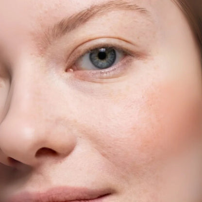 Close-up of a person's eye with a blurred background