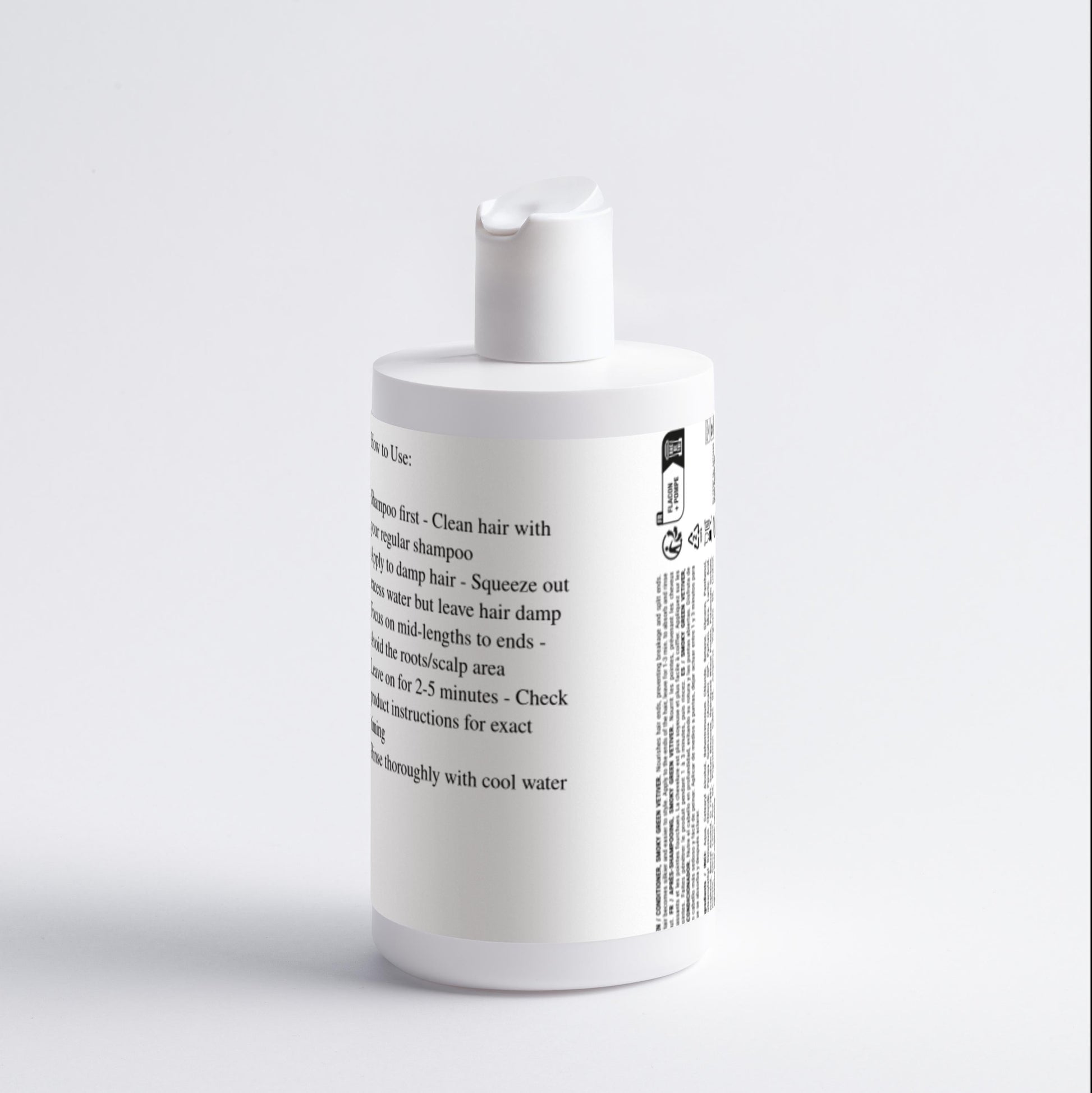White bottle with text on a light gray background
