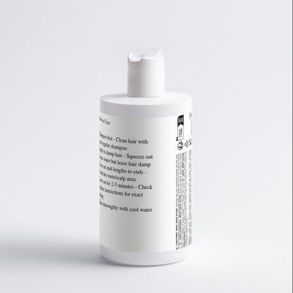 White bottle with text on a light gray background